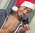 Gay guy with Santa hat on