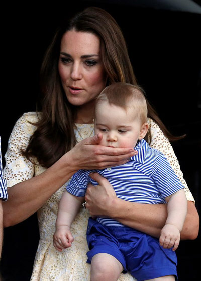 Kate Middleton holding Prince George