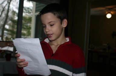 Boy reading suicide letter