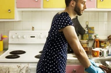 Man in an apron in the kitchen