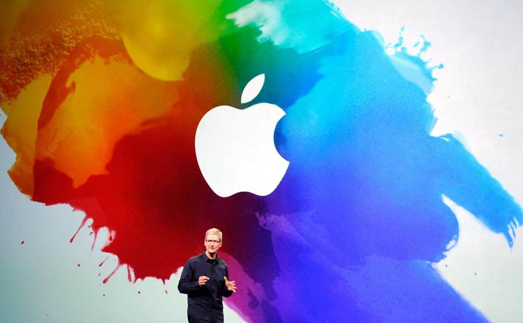 Apple speech on stage by Tim Cook with color splash