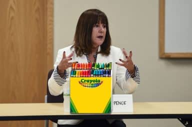 Karen Pence with a box of Crayola Crayons
