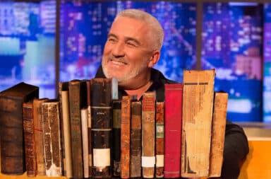 Paul Hollywood with a lot of books