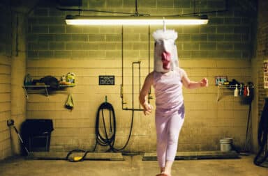 Human unicorn in a basement science lab