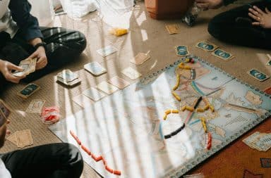 folks playing a board game
