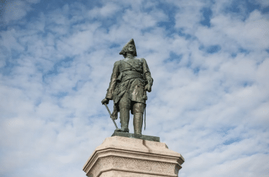 Statue posed high up