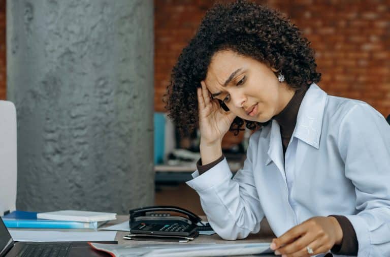 woman stressed at the computer