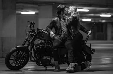 couple with a motorcycle