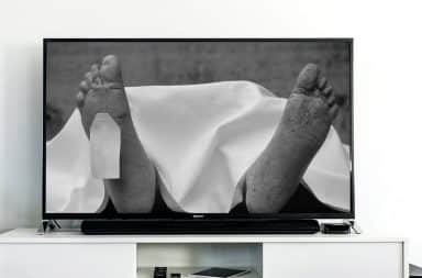 a dead body on TV